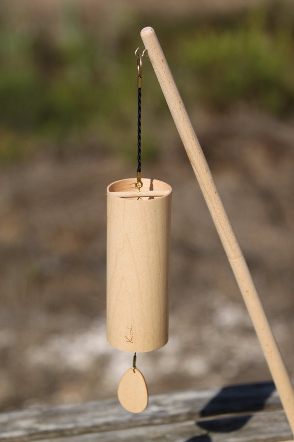Koshi Ocean wind chime hanging from the Flower of Life stand, handmade in France