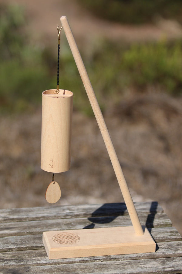 Koshi Ocean chime in maple on the Flower of Life single chime stand