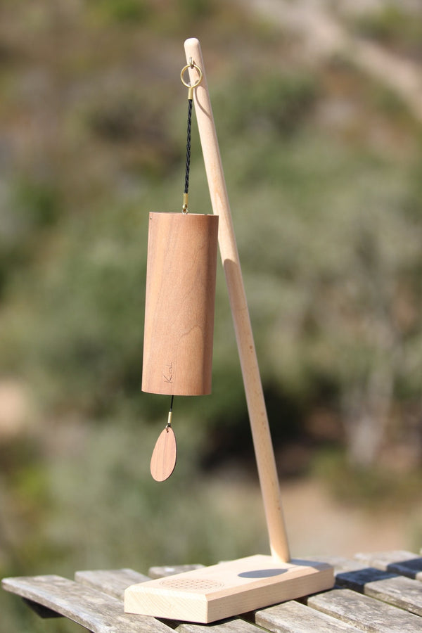 Koshi Mountain Earth Symphony chime with 12 rods and walnut resonance chamber, outdoors