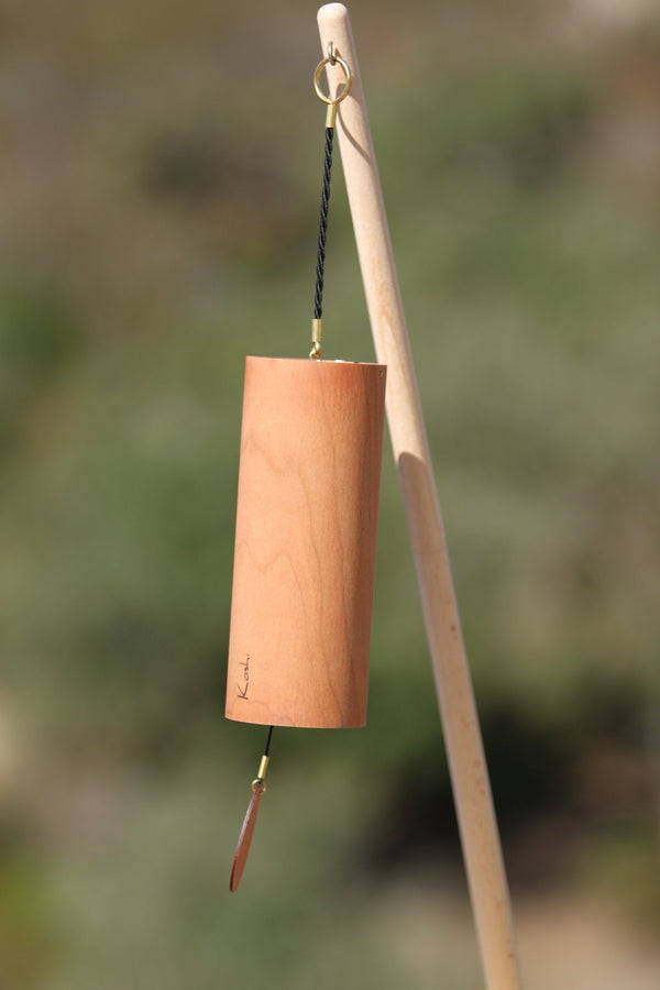 Koshi River wind chime with cherry resonance chamber hanging from the Flower of Life stand
